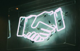 Neon handen schudden